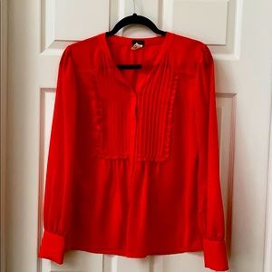 Bright orange 🍊 pleated top with little ruffle